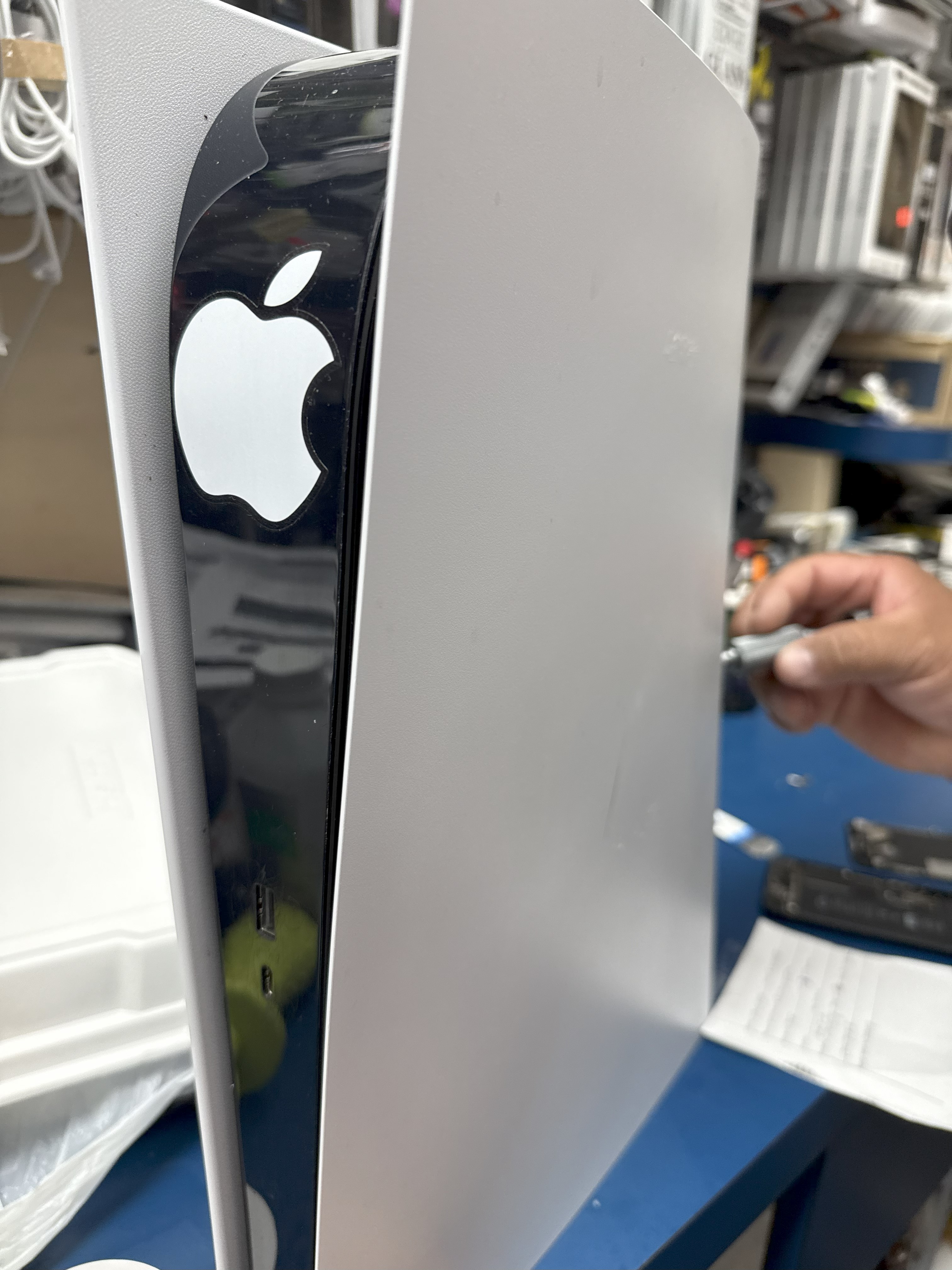 Gaming console repair station at Premier Express Repairs